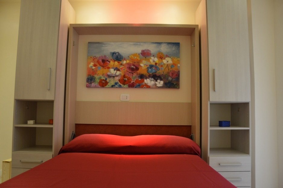 Camera Matrimoniale con Letto Matrimoniale bagno privato e cucinotto in camera tariffa Euro 55,00 a notte